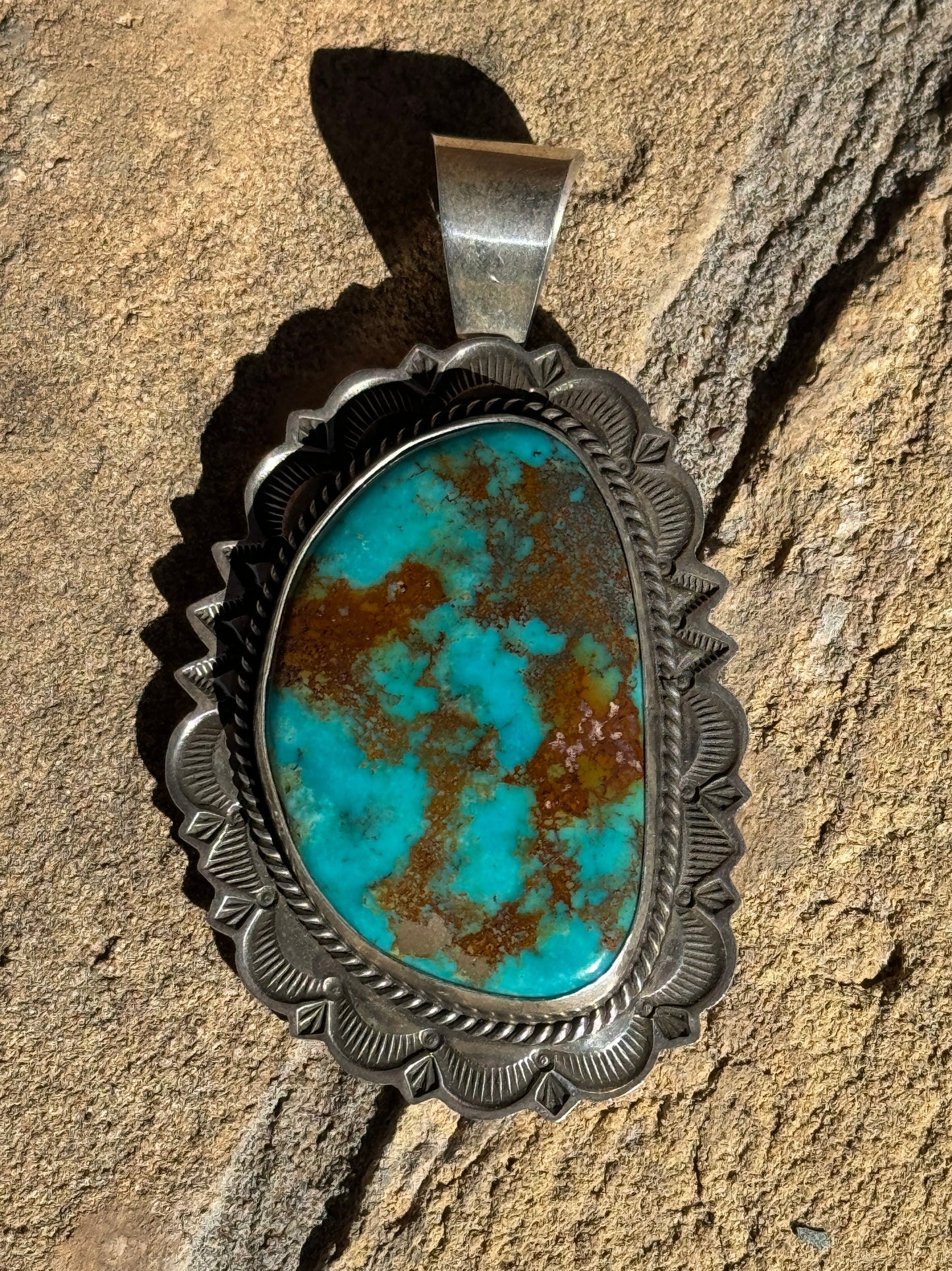 Stunning Kingman Ceremonial turquoise stamped pendant