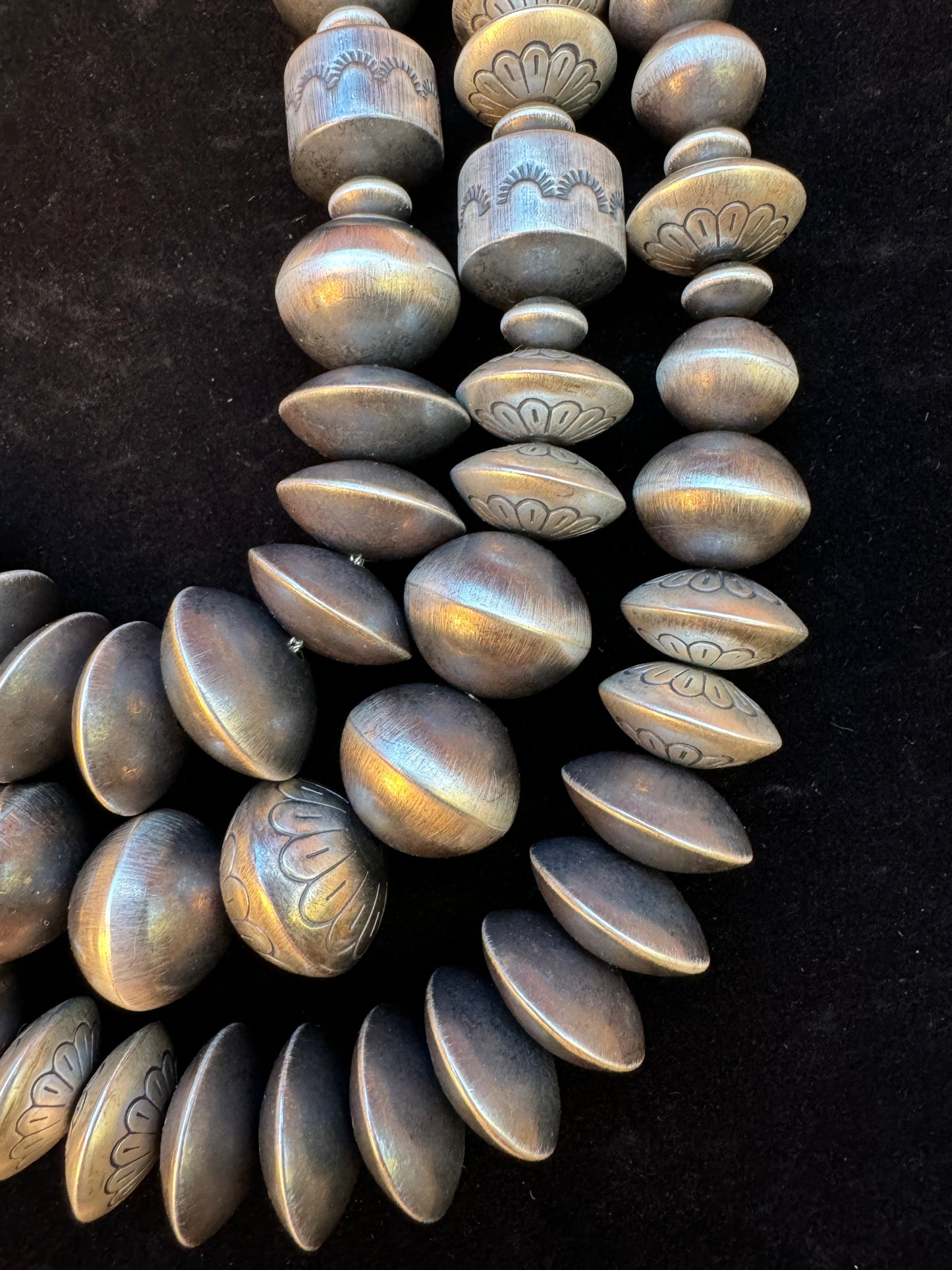 Stamped saucer Navajo pearls by Rose Martin, 24”