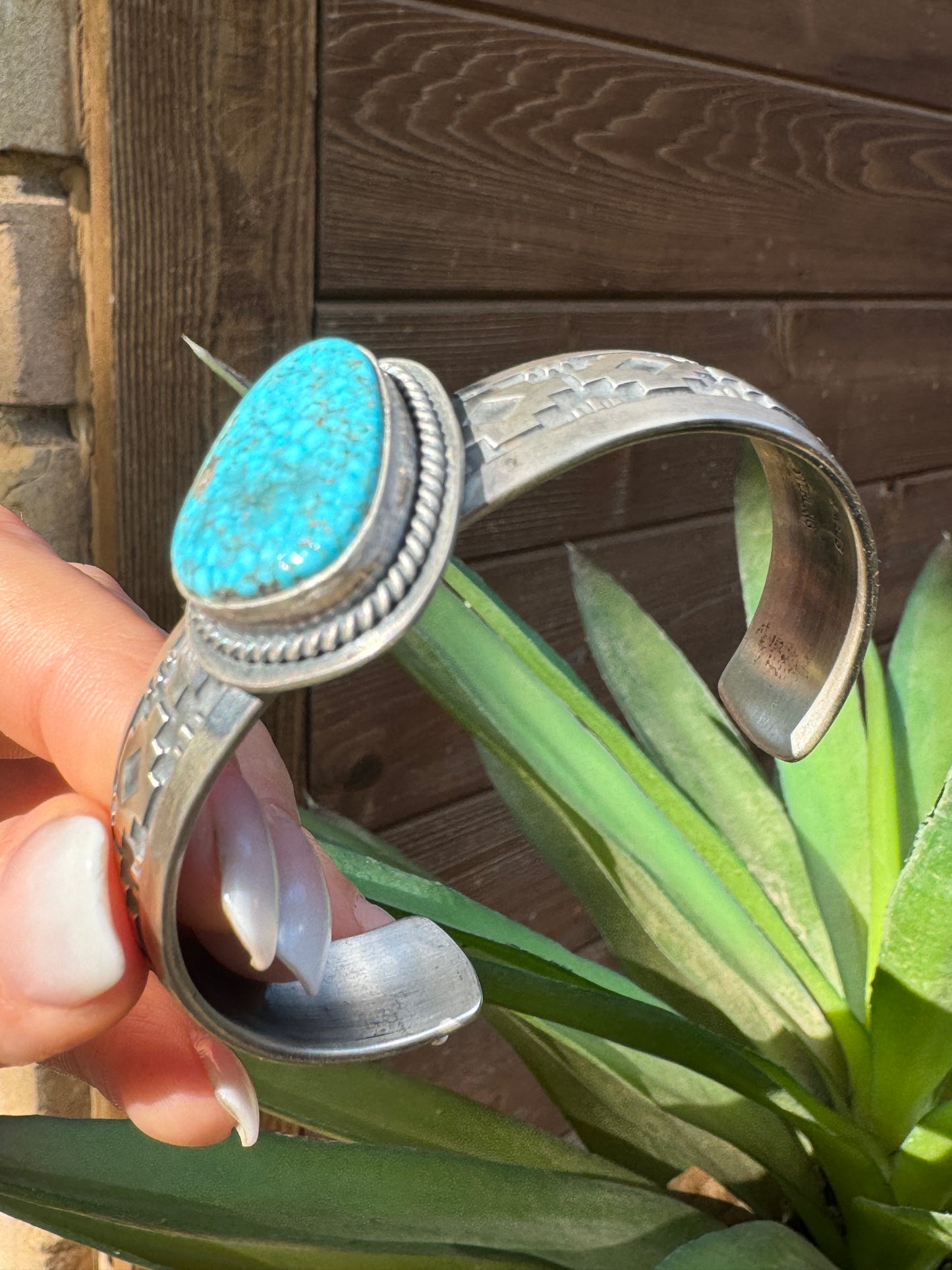 Turquoise cuff with Aztec design
