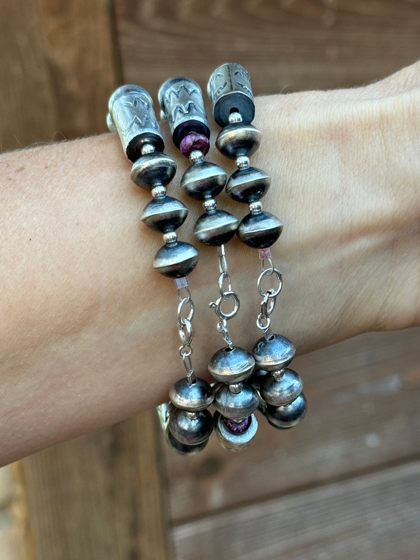 Sterling silver Navajo style beaded bracelet with stamped barrel beads