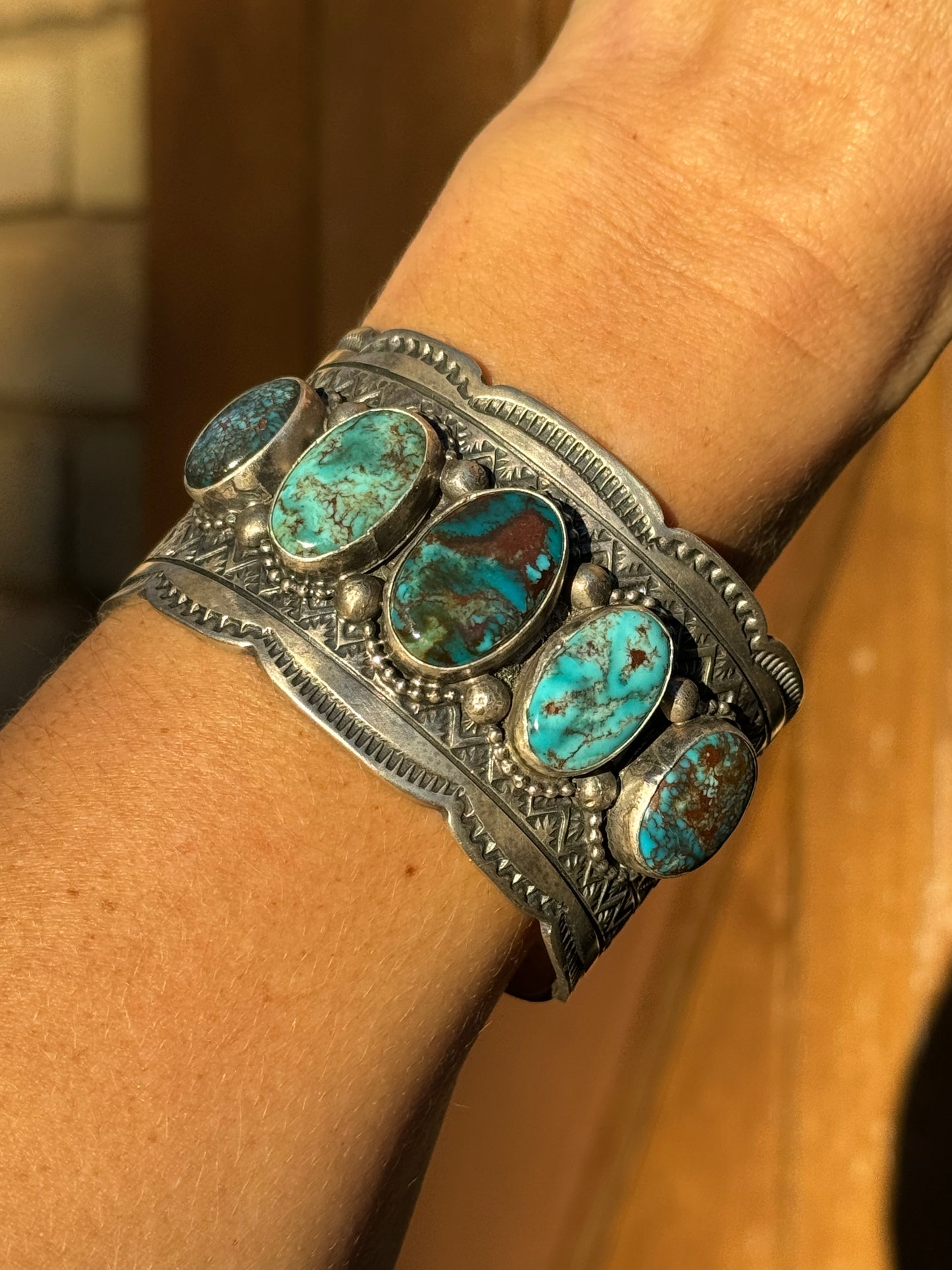 Kingman turquoise Navajo handmade stamped cuff