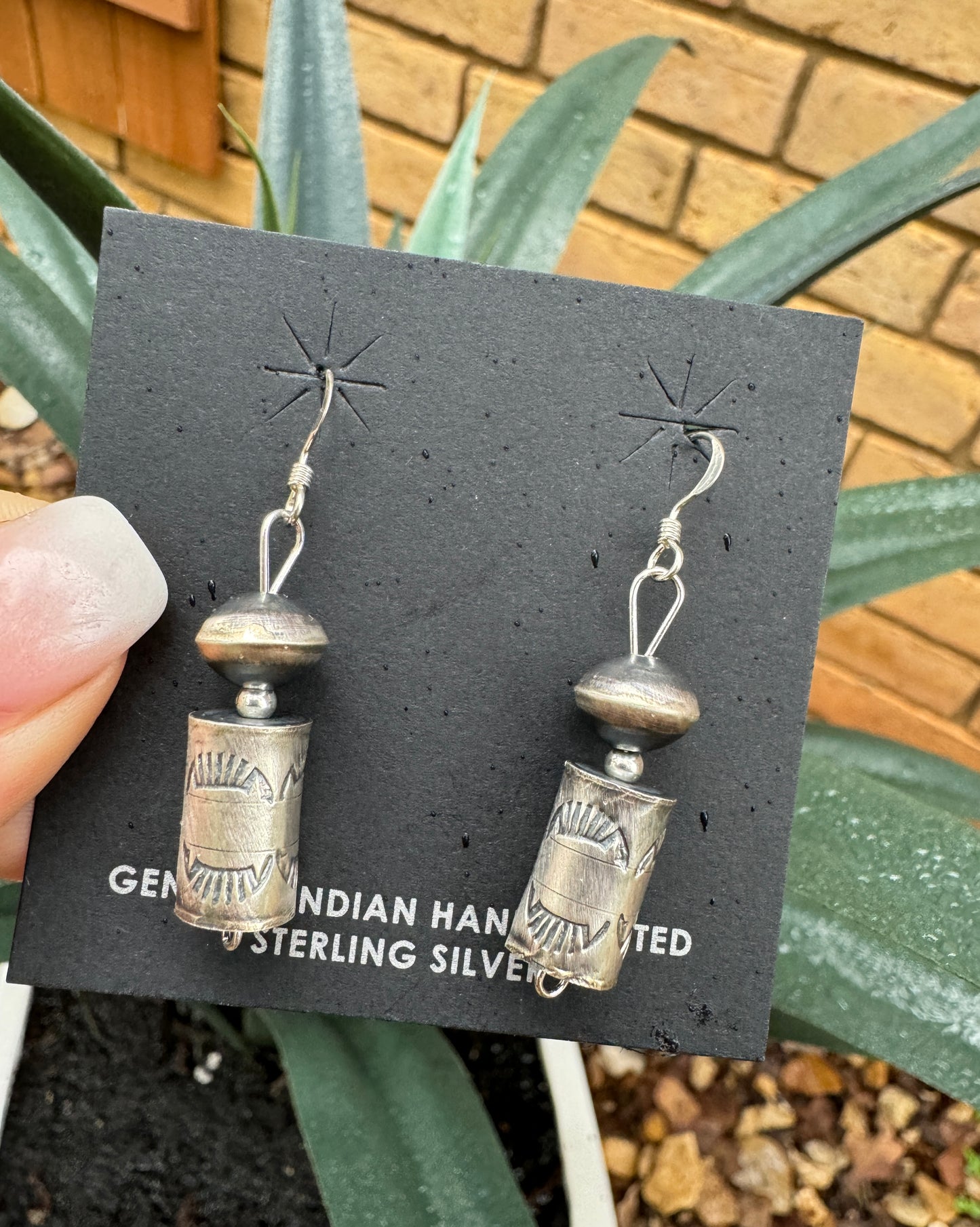 Stamped Navajo pearl and barrel earrings