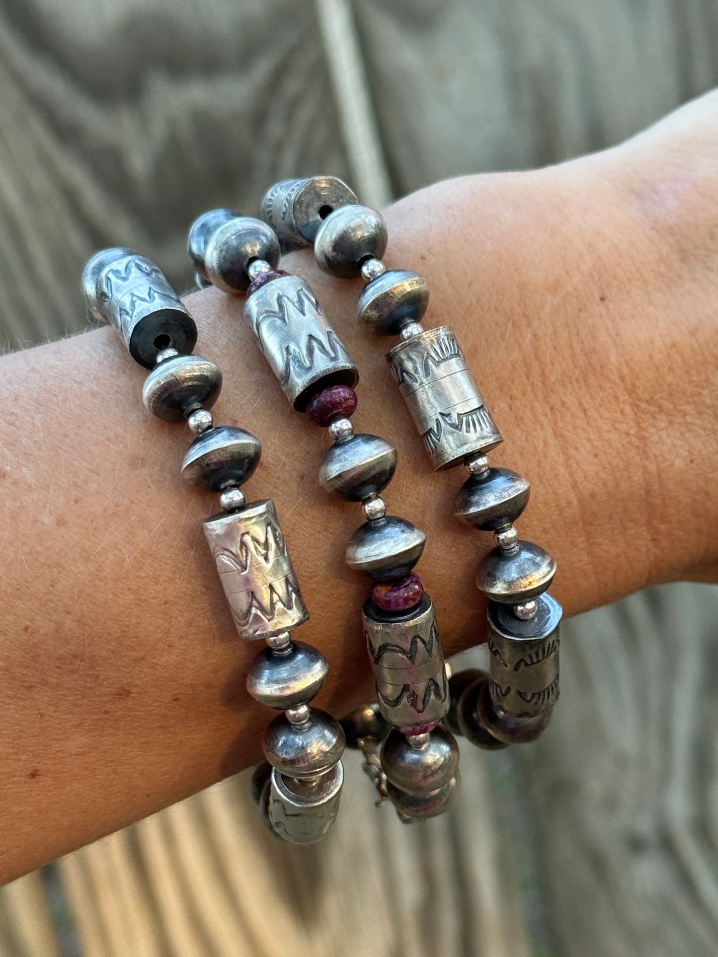 Sterling silver Navajo style beaded bracelet with stamped barrel beads