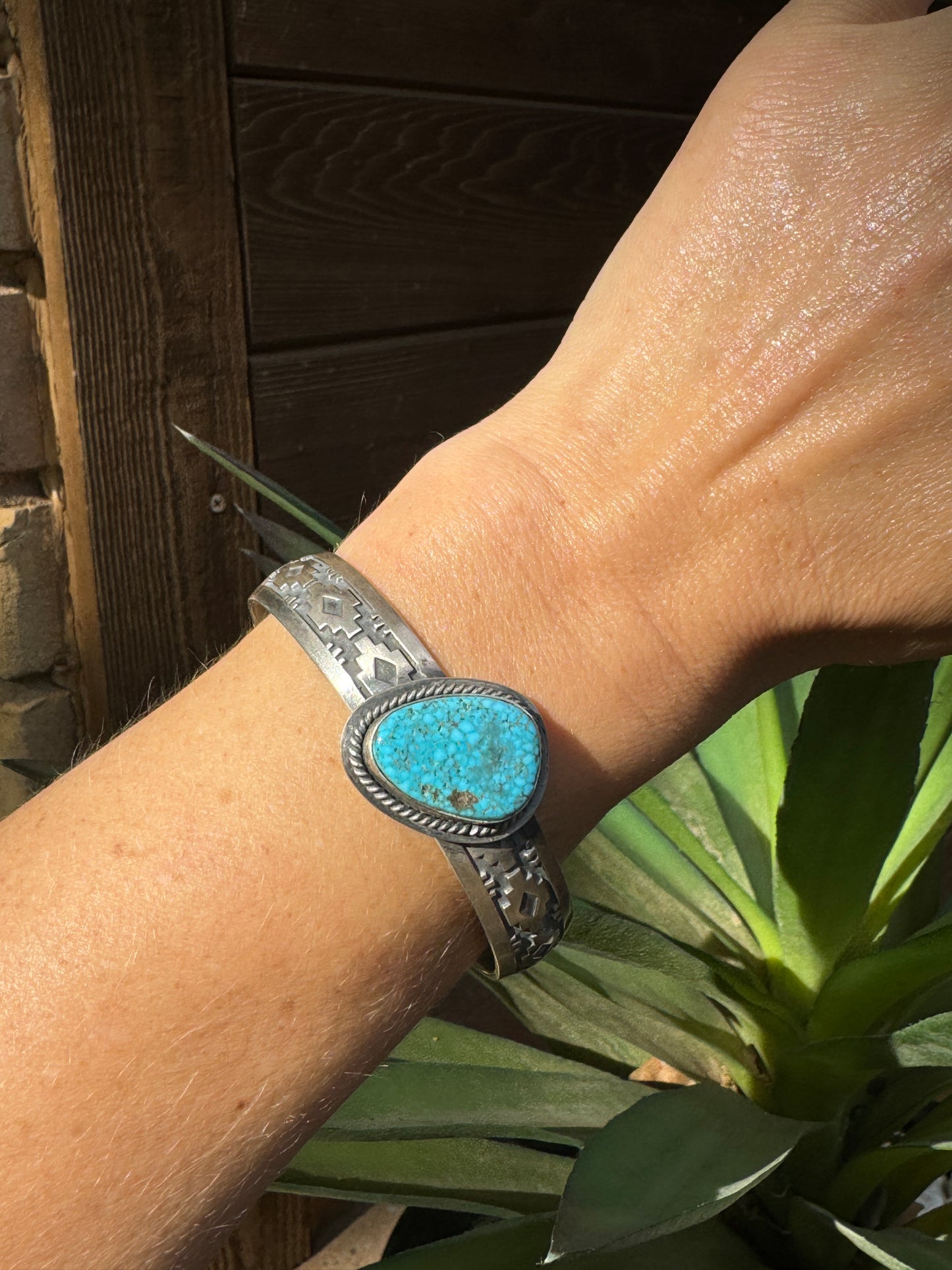 Turquoise cuff with Aztec design
