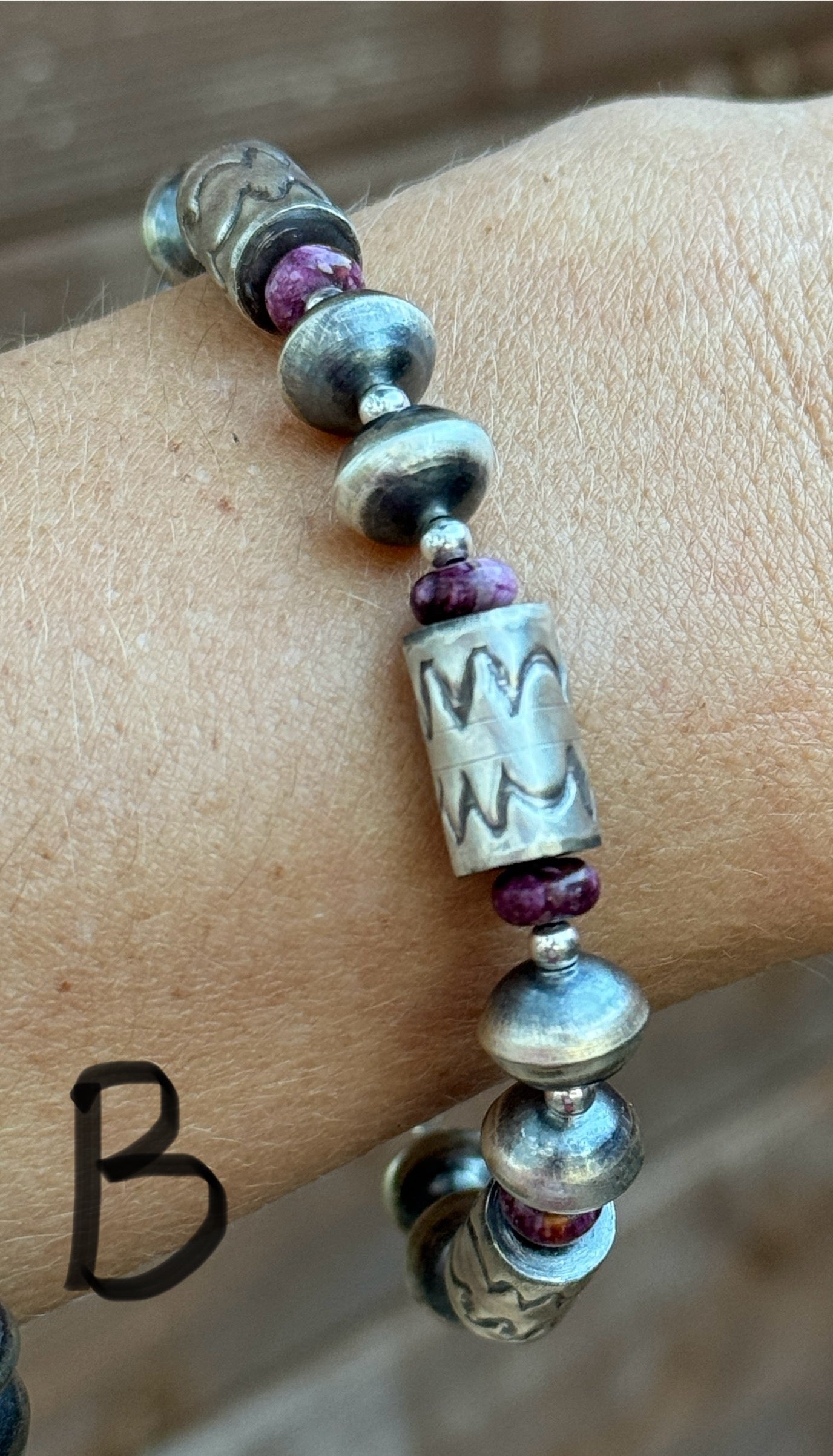 Sterling silver Navajo style beaded bracelet with stamped barrel beads