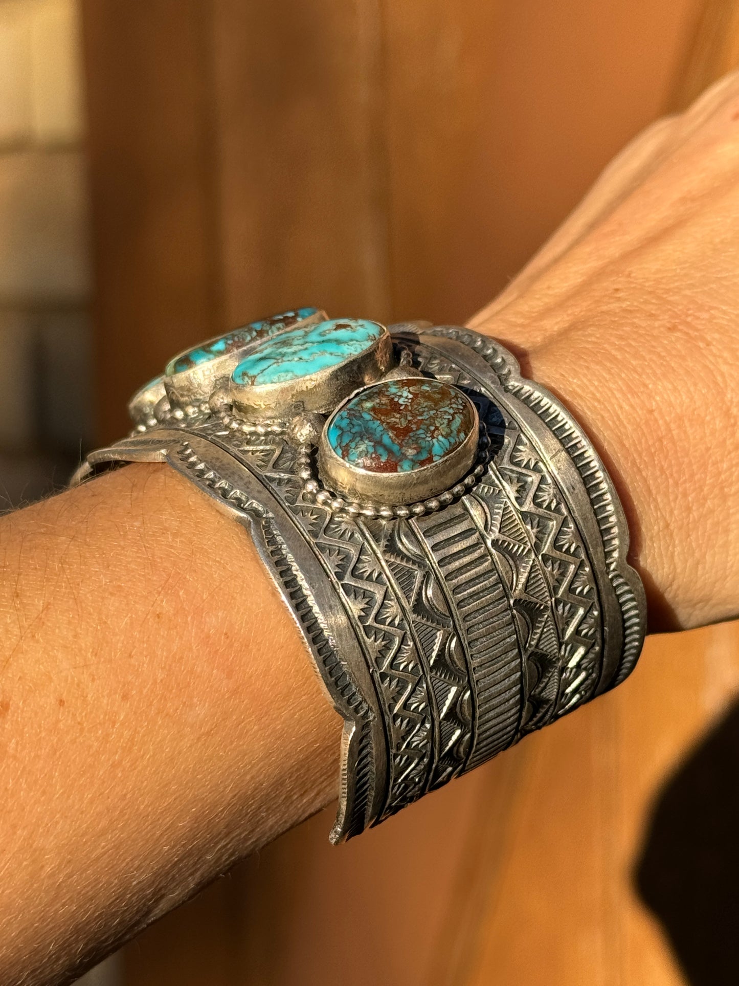 Kingman turquoise Navajo handmade stamped cuff