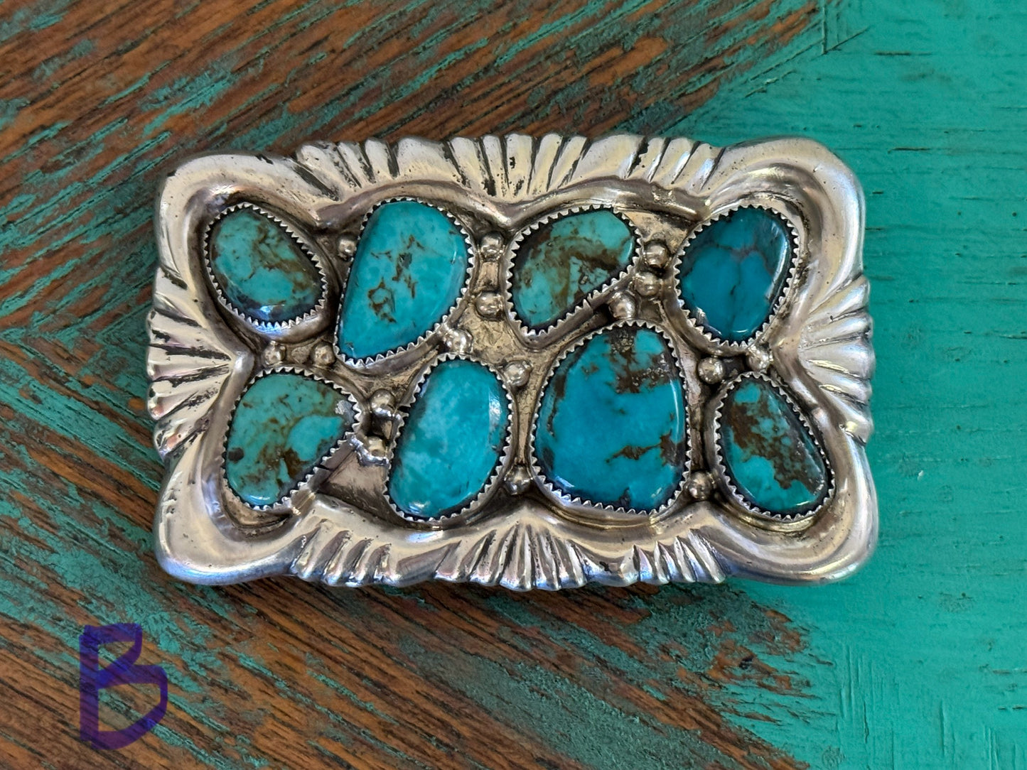 Sterling silver buckle with 8 large turquoise stones