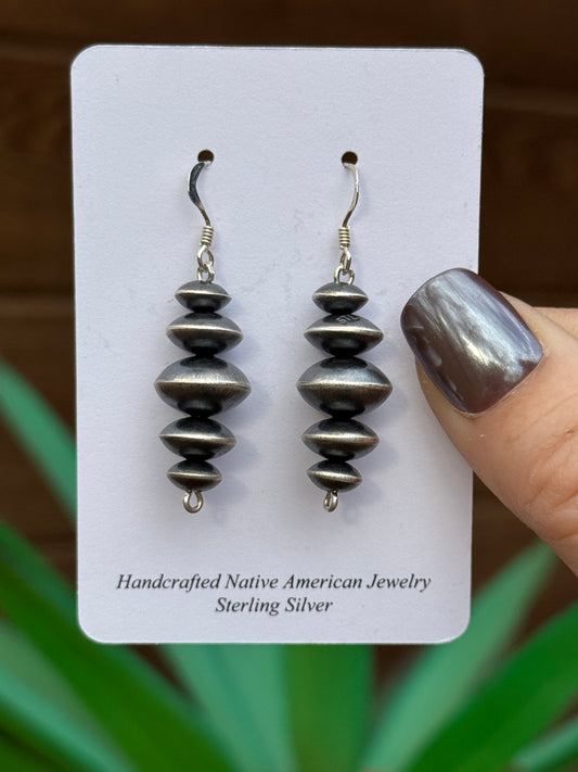 Preston Haley handmade Navajo pearl Rondelle style earrings