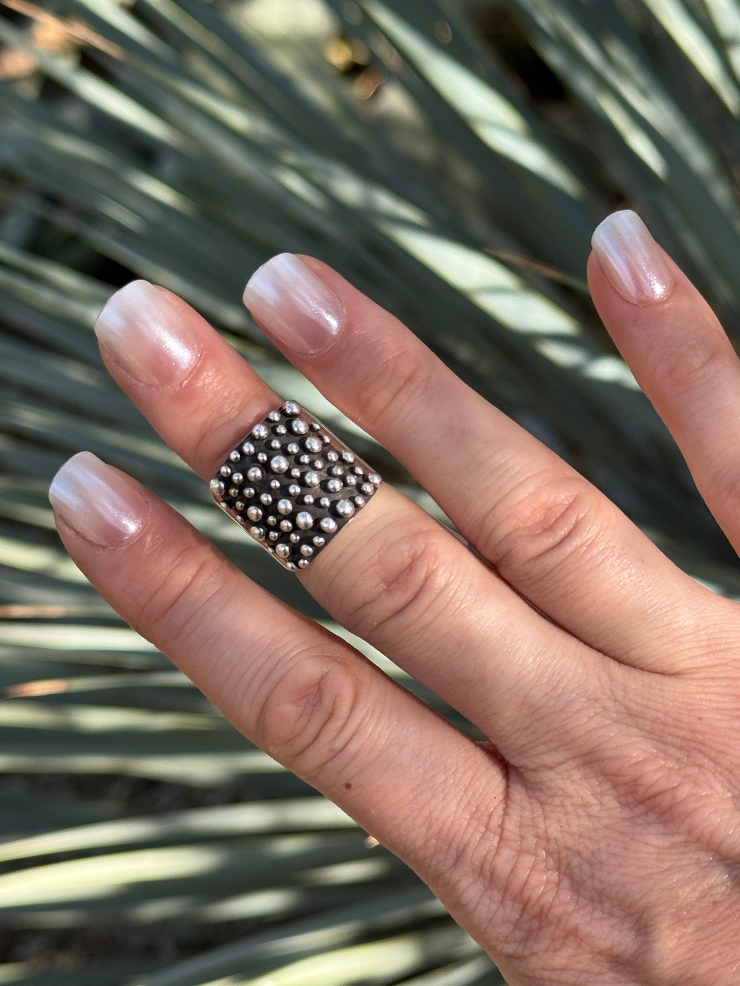 Sterling silver drop ring by Raymond Coriz, size 6