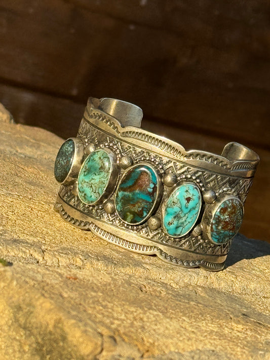 Kingman turquoise Navajo handmade stamped bracelet