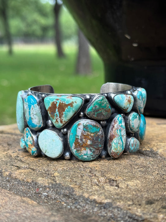 A Spencer mixed turquoise Sterling silver cuff