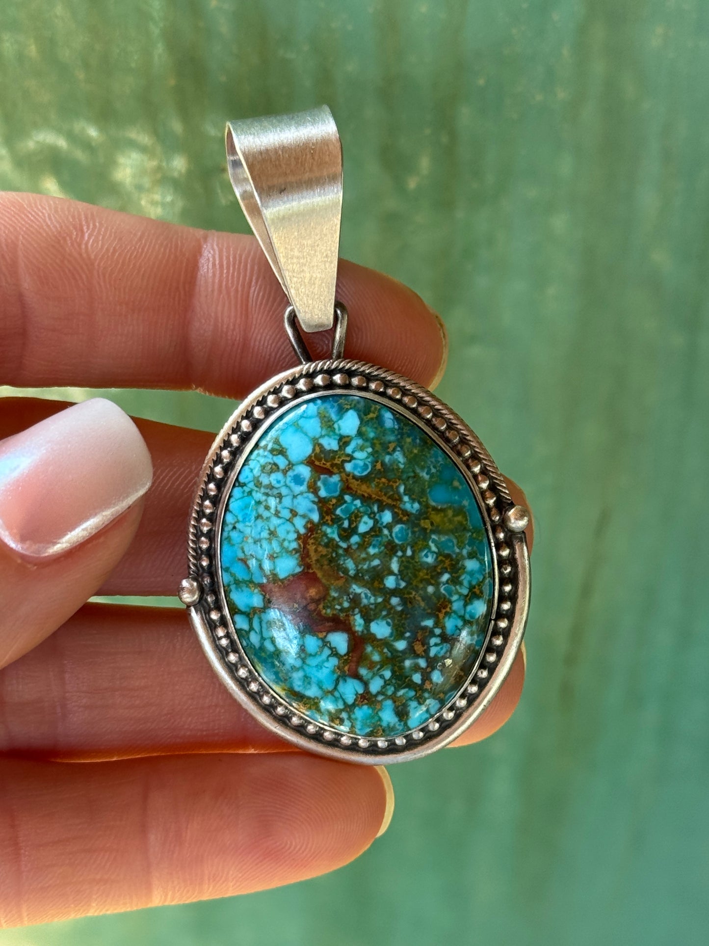 High quality D. Benally Sterling Silver Turquoise pendant