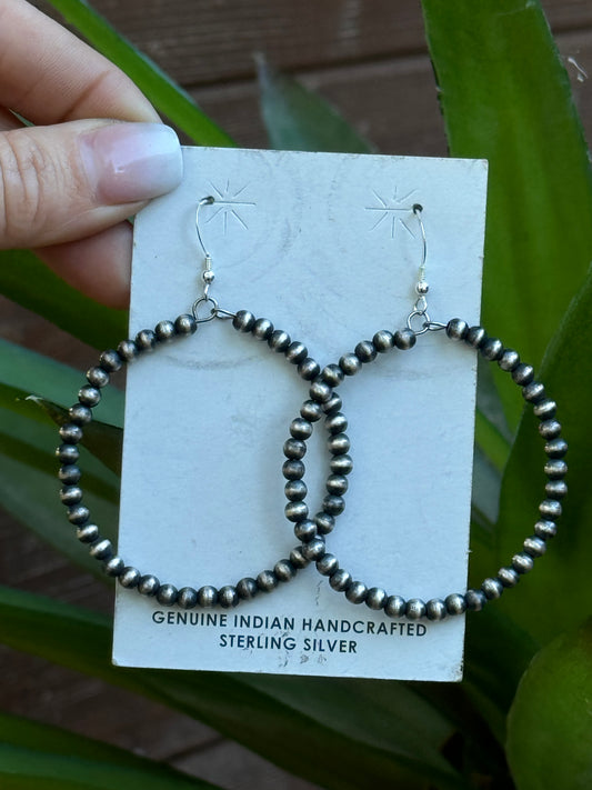 Sterling silver Navajo-style pearl hoop earrings