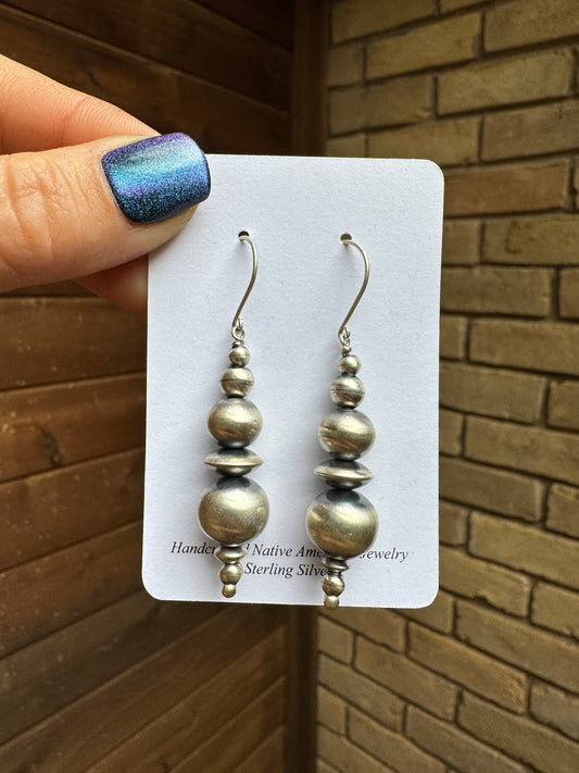 Navajo pearl earrings by Rena Begay